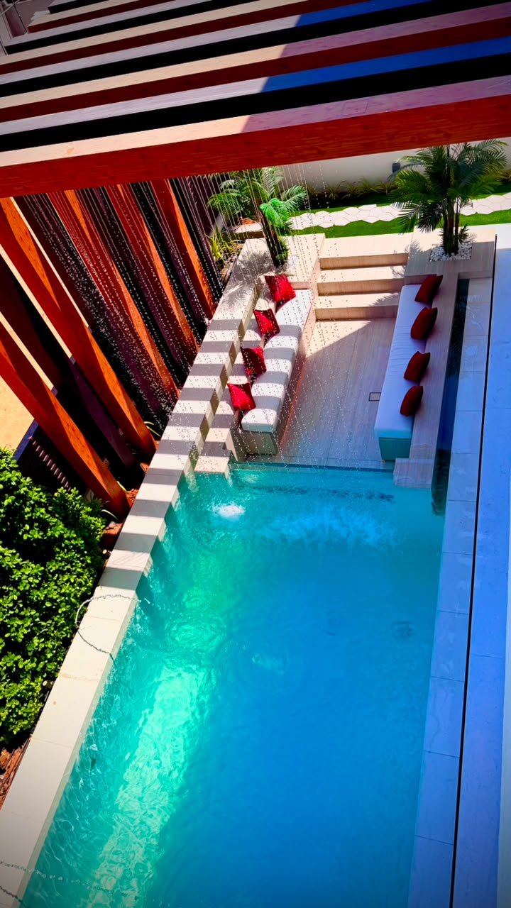 A stylish modern home with a dedicated car parking space, highlighting innovative design and a welcoming exterior.